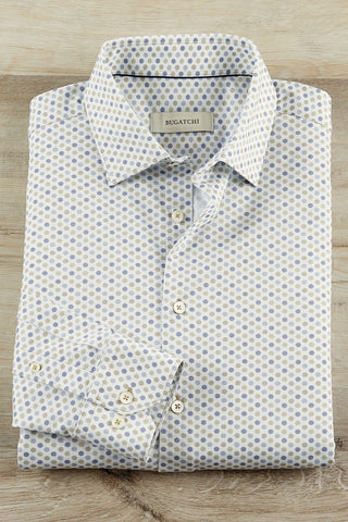 Folded patterned shirt with 'BOSS' branding on a wooden surface