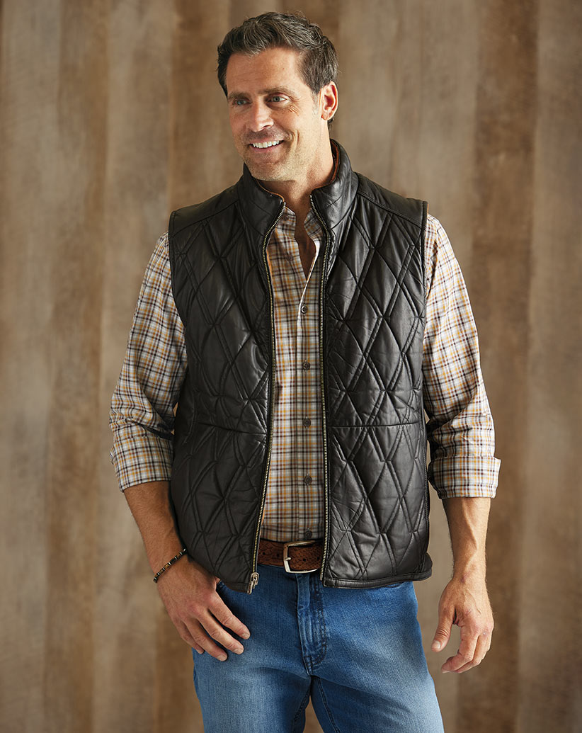 Male model wearing Reserve Reversible Leather Vest